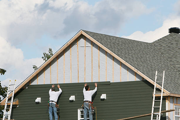 Professional Storm Damage Siding Repair technician working in Smithsburg, MD